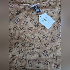 Brown Patterned Fabric with Symbols